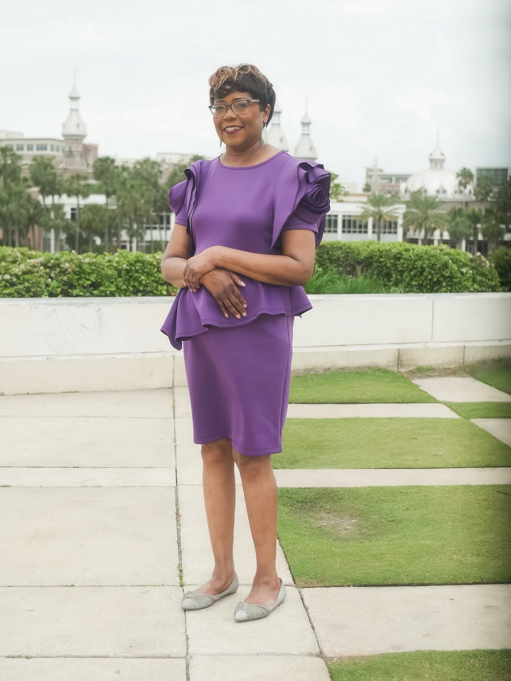 65th birthday portrait with downtown Tampa in the background
