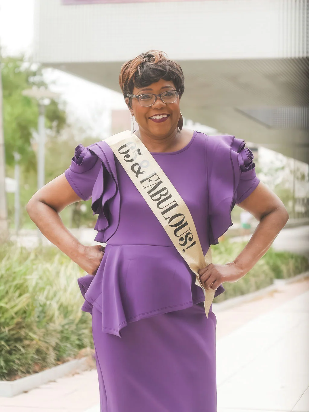 65th birthday guest smiling during her Tampa Riverwalk celebration